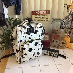 ‘Living Traveling Share’ Canvas Cow Print Backpack